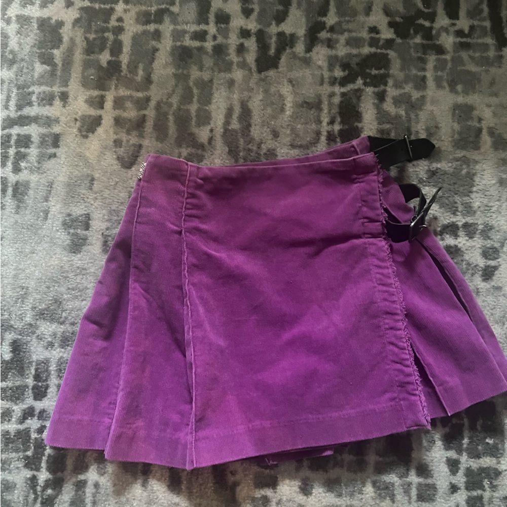 Burberry Purple Corduroy kilt with two leather buckles.